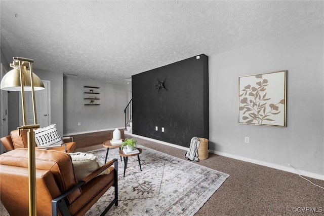410 Airycrest Dr, Highland Springs, VA 23075 - carpeted living room featuring a textured ceiling and stairway