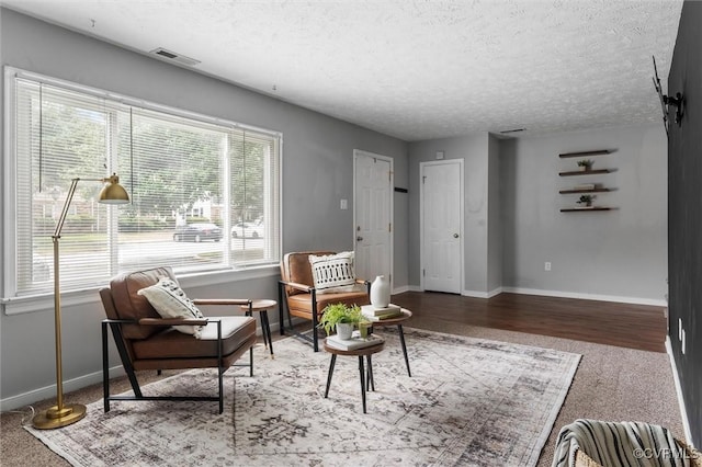 410 Airycrest Dr, Highland Springs, VA 23075 - living area featuring a textured ceiling and wood finished floors