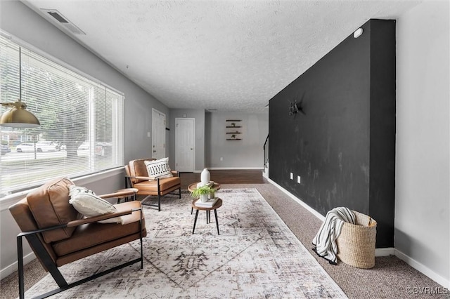 410 Airycrest Dr, Highland Springs, VA 23075 - living area with a textured ceiling, healthy amount of natural light, and carpet floors