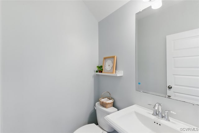 8045 Ellendale Dr, Mechanicsville, VA 23116 - bathroom featuring a sink and lofted ceiling