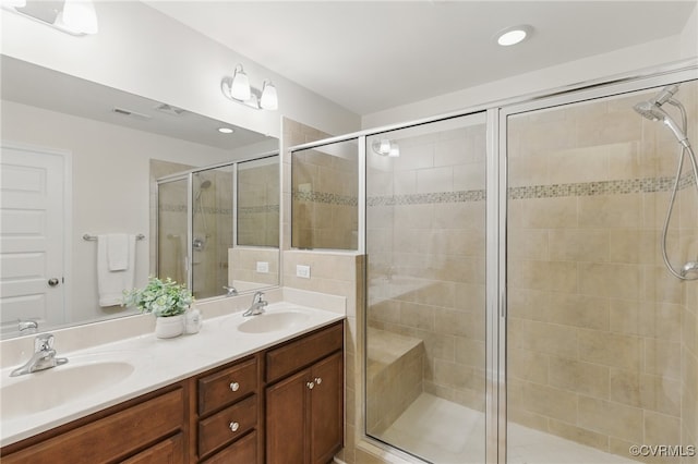 8045 Ellendale Dr, Mechanicsville, VA 23116 - full bathroom featuring a shower stall and double vanity