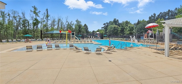 8045 Ellendale Dr, Mechanicsville, VA 23116 - community pool with a patio, a pergola, and view of scattered trees