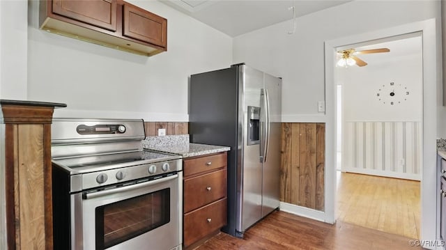 2702 Pate Ave, Chesterfield, VA 23234 - kitchen with stainless steel appliances, dark wood finished floors, ceiling fan, brown cabinets, and light stone countertops