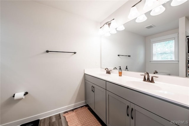 12325 Petrel Xing Unit 7, Midlothian, VA 23112 - full bathroom featuring wood finished floors and double vanity