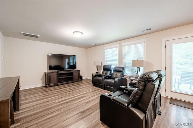 12325 Petrel Xing Unit 7, Midlothian, VA 23112 - living area featuring light wood finished floors and healthy amount of natural light