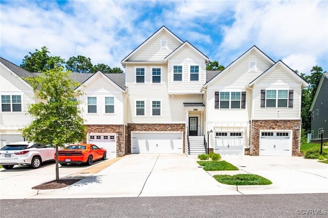 12325 Petrel Xing Unit 7, Midlothian, VA 23112 - view of property featuring stone siding, driveway, and a garage