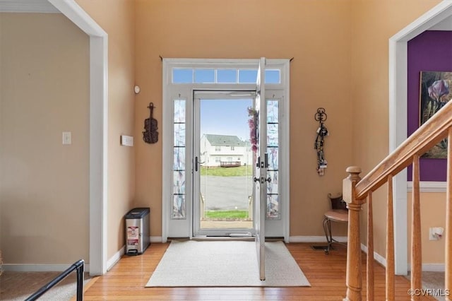 1408 Windrow Ct, Henrico, VA 23223 - entrance foyer featuring light wood finished floors and stairway