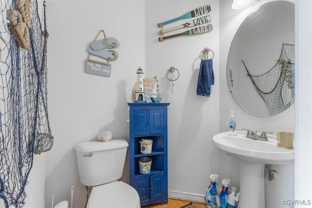 1408 Windrow Ct, Henrico, VA 23223 - bathroom with toilet and wood finished floors