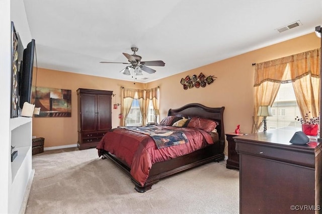 1408 Windrow Ct, Henrico, VA 23223 - bedroom featuring multiple windows, light colored carpet, and ceiling fan