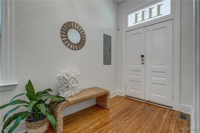 1111 N 23rd St, Richmond, VA 23223 - foyer entrance featuring electric panel and light wood-style flooring