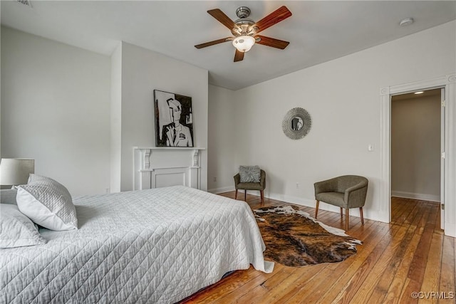 1111 N 23rd St, Richmond, VA 23223 - bedroom with hardwood / wood-style floors and a ceiling fan