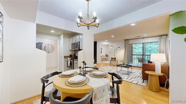 2106 Turtle Run Dr Unit 7, Henrico, VA 23233 - dining room with a chandelier, light wood-style floors, and recessed lighting