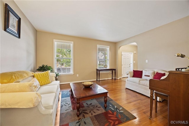 2024 Rose Family Dr, Midlothian, VA 23112 - living area featuring arched walkways and wood finished floors