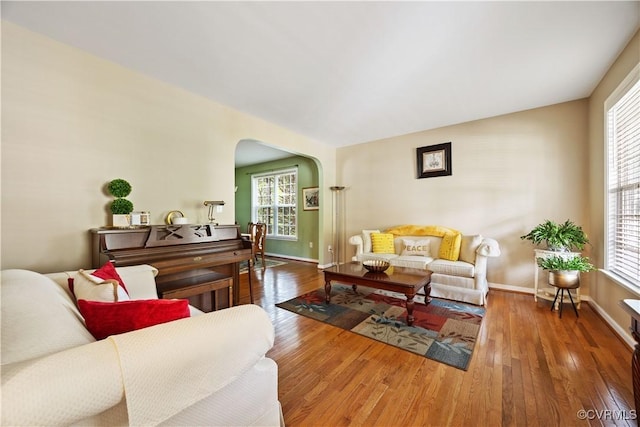 2024 Rose Family Dr, Midlothian, VA 23112 - living room with arched walkways and hardwood / wood-style floors