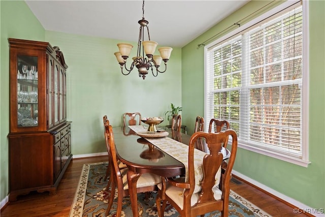 2024 Rose Family Dr, Midlothian, VA 23112 - dining room featuring a chandelier and dark wood-type flooring