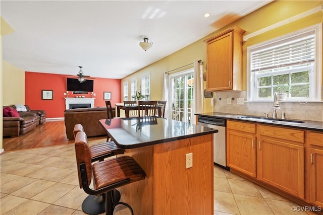 2024 Rose Family Dr, Midlothian, VA 23112 - kitchen with dishwasher, plenty of natural light, a breakfast bar, a kitchen island, and recessed lighting