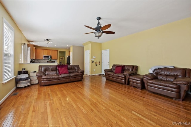 2024 Rose Family Dr, Midlothian, VA 23112 - living room featuring light wood-type flooring, healthy amount of natural light, a ceiling fan, and recessed lighting