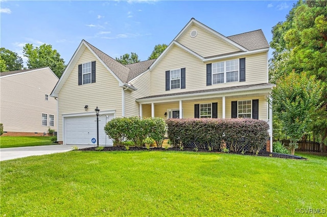 2024 Rose Family Dr, Midlothian, VA 23112 - traditional-style house featuring concrete driveway, a front lawn, a garage, and covered porch