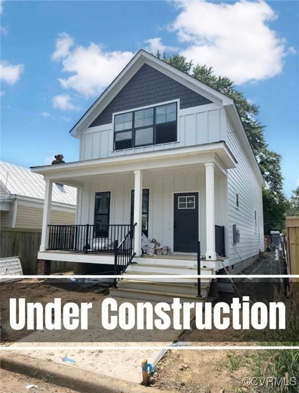 18 W 29th St, Richmond, VA 23223 - view of front of home featuring covered porch and board and batten siding