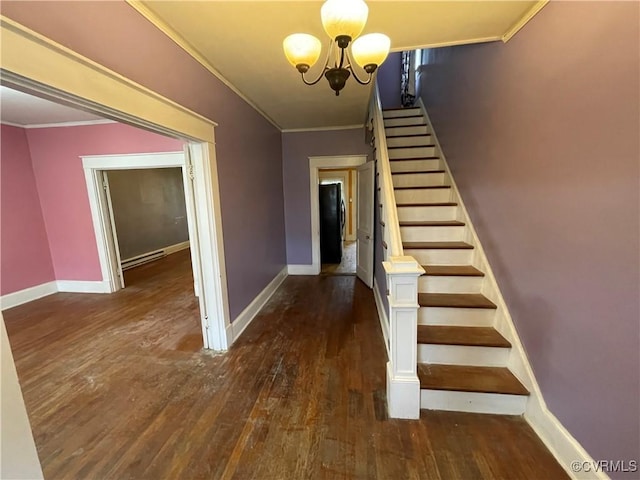 1527 National St, Richmond, VA 23231 - stairs featuring hardwood / wood-style flooring, a chandelier, crown molding, and baseboard heating