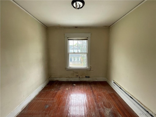 1527 National St, Richmond, VA 23231 - spare room featuring baseboard heating, hardwood / wood-style flooring, and ornamental molding