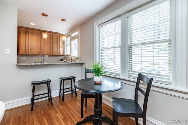 1112 Roseneath Rd Unit U1, Richmond, VA 23230 - dining space with light wood-style flooring and baseboards