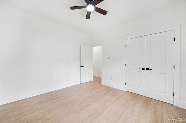 425 Palomino Dr, Louisa, VA 23093 - unfurnished bedroom with light wood-style floors, a closet, and ceiling fan