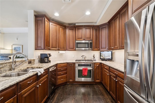 1231 Byrd Ave Unit 2C, Henrico, VA 23226 - kitchen featuring stainless steel appliances, dark wood-style floors, light stone counters, crown molding, and recessed lighting