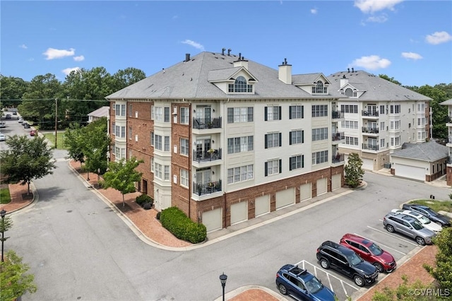 1231 Byrd Ave Unit 2C, Henrico, VA 23226 - view of apartment building / complex with uncovered parking