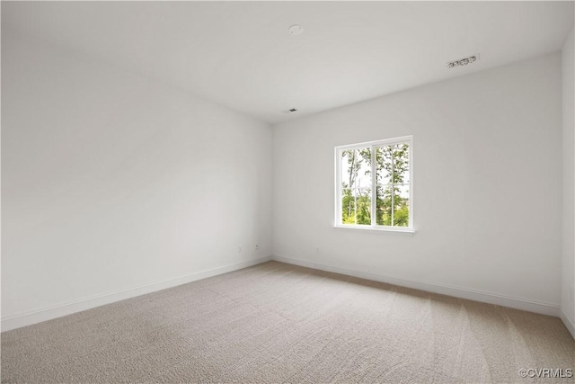 7204 Leire Ln, Moseley, VA 23832 - spare room featuring light carpet and baseboards