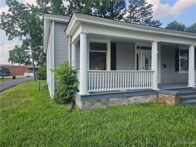 116 Fairfax Ave, Colonial Heights, VA 23834 - view of side of home featuring a yard and covered porch