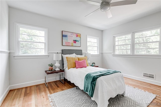 7654 Cherokee Rd, Richmond, VA 23225 - bedroom with wood finished floors and a ceiling fan