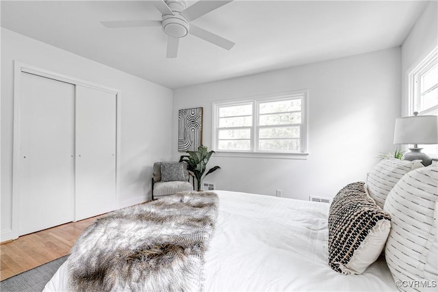 7654 Cherokee Rd, Richmond, VA 23225 - bedroom with wood finished floors, a closet, and a ceiling fan