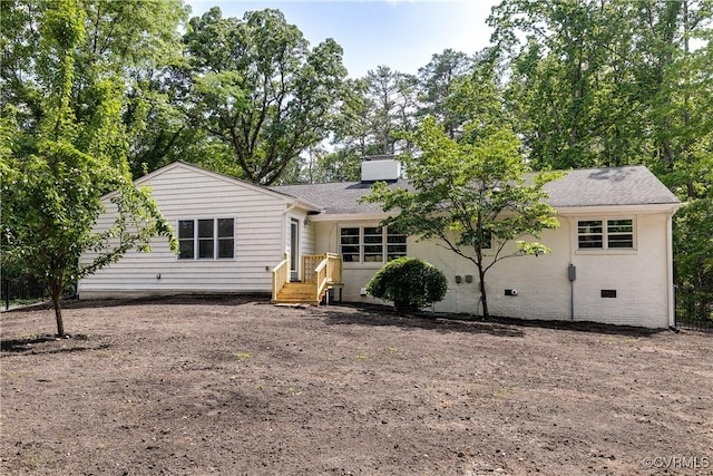 7654 Cherokee Rd, Richmond, VA 23225 - back of property with a chimney, roof with shingles, and crawl space