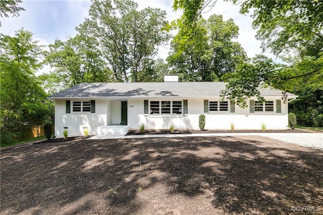 7654 Cherokee Rd, Richmond, VA 23225 - single story home with a chimney and roof with shingles