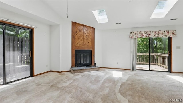 4804 Hackney Rd, Richmond, VA 23234 - unfurnished living room with a skylight, healthy amount of natural light, and carpet floors