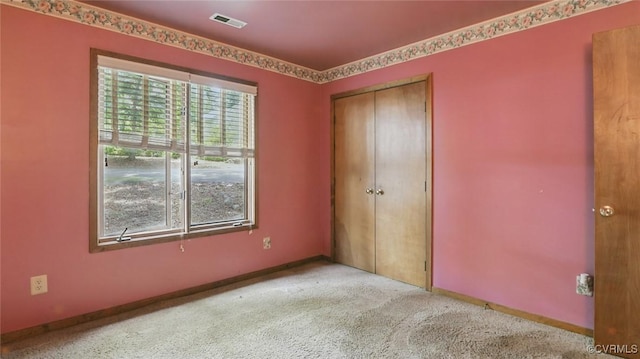 4804 Hackney Rd, Richmond, VA 23234 - unfurnished bedroom with a closet and carpet floors