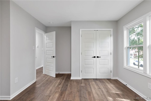 2914 Griffin Ave, Richmond, VA 23222 - unfurnished bedroom featuring dark wood-style flooring and a closet