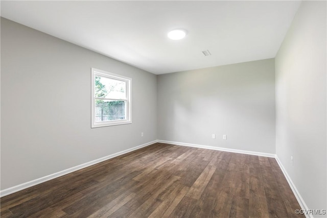 2914 Griffin Ave, Richmond, VA 23222 - spare room featuring dark wood-type flooring and baseboards