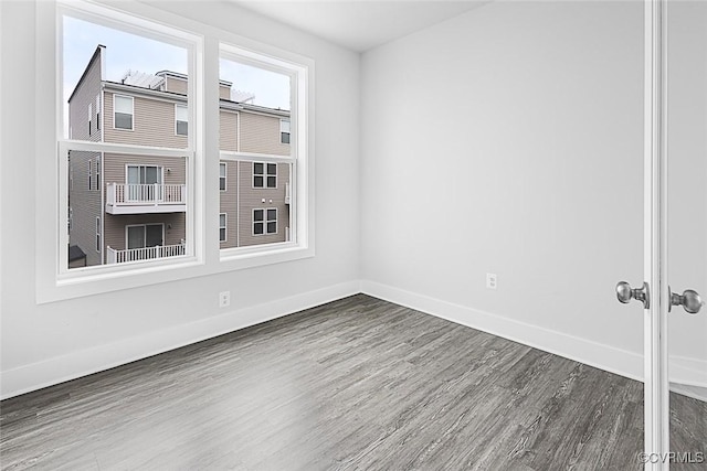 2642 Lassen Walk Unit B, Henrico, VA 23294 - empty room featuring dark wood-style floors and baseboards