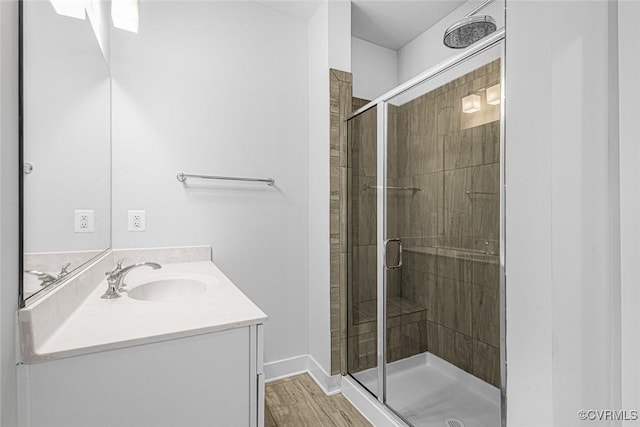 2642 Lassen Walk Unit B, Henrico, VA 23294 - bathroom with vanity, a stall shower, and wood finished floors