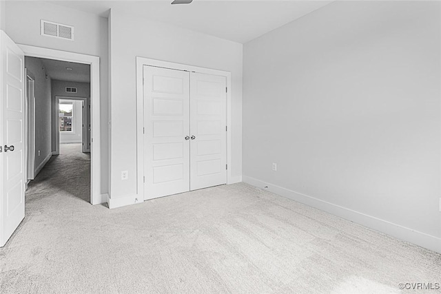 2642 Lassen Walk Unit B, Henrico, VA 23294 - unfurnished bedroom featuring carpet flooring and a closet