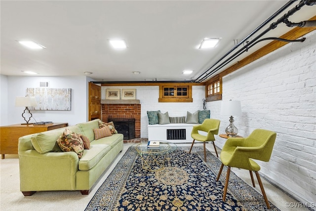113 Tuckahoe Blvd, Richmond, VA 23226 - carpeted living room featuring a brick fireplace and brick wall
