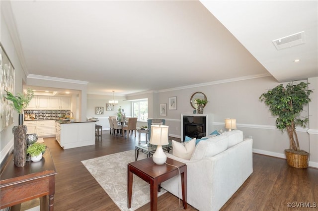 2956 Hathaway Rd Unit U606, Richmond, VA 23225 - living room featuring dark wood-style flooring, ornamental molding, and recessed lighting