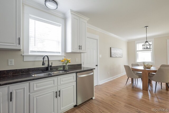 4806 Cutshaw Ave, Richmond, VA 23230 - kitchen with stainless steel dishwasher, white cabinets, crown molding, light wood-style flooring, and hanging light fixtures