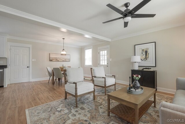 4806 Cutshaw Ave, Richmond, VA 23230 - living room with light wood finished floors, ornamental molding, and ceiling fan