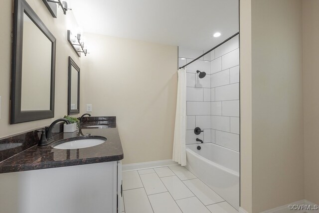4806 Cutshaw Ave, Richmond, VA 23230 - bathroom with double vanity, shower / tub combo, tile patterned flooring, and recessed lighting