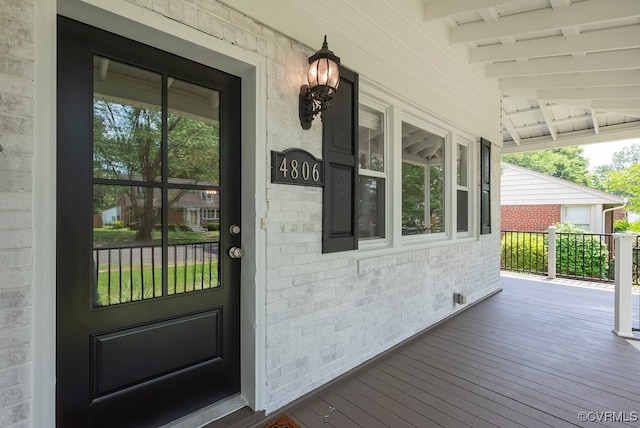 4806 Cutshaw Ave, Richmond, VA 23230 - view of exterior entry with a porch and brick siding