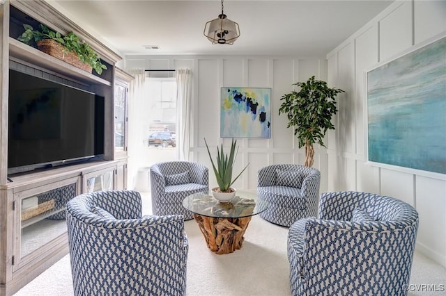 15730 Canoe Pointe Loop, Moseley, VA 23120 - living area featuring a decorative wall and carpet