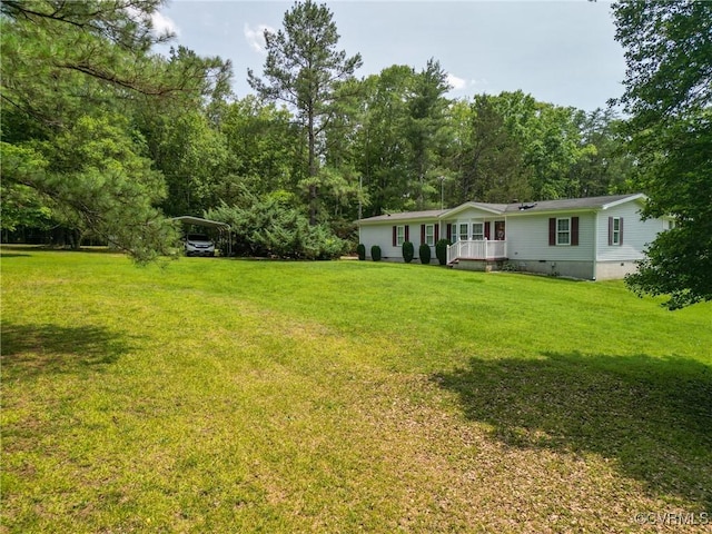 967 Ampthill Rd, Cartersville, VA 23027 - view of green lawn featuring a detached carport
